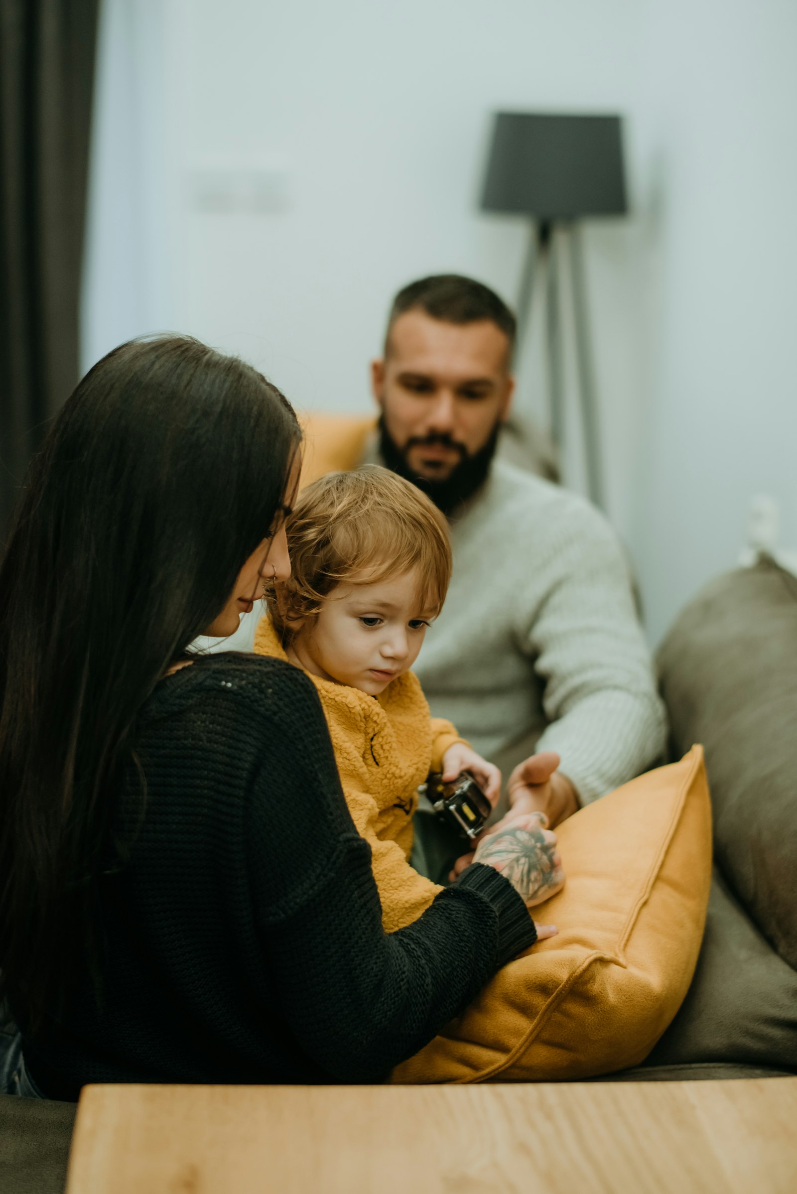 A family sitting together at home